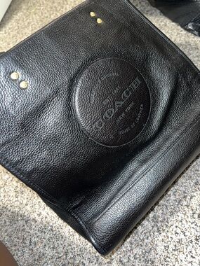 COACH Demsey Black Pebbled Leather Messenger with Embossed Round Logo